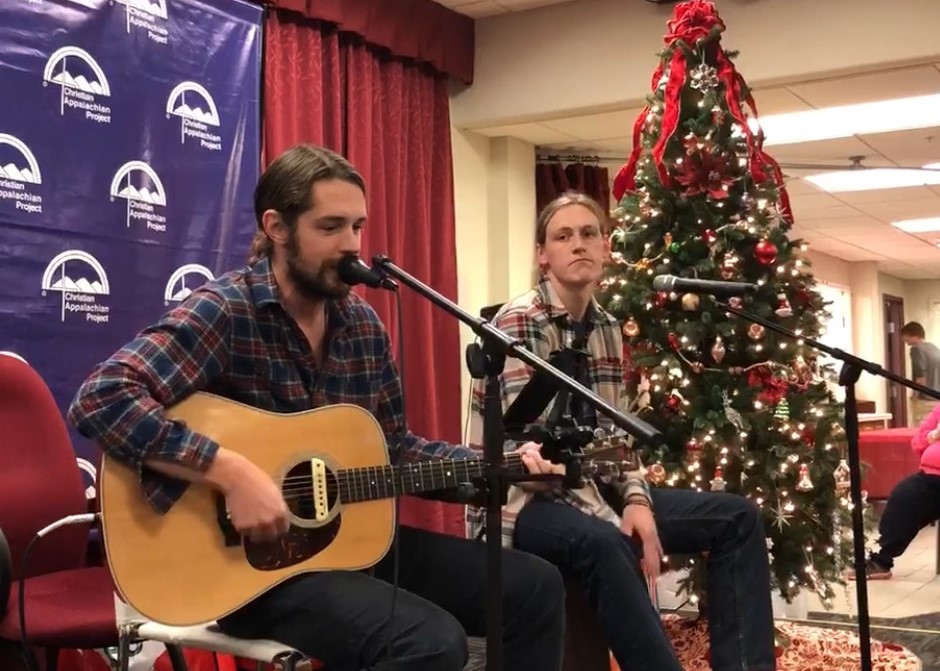 Nick Jamerson of Sundy Best and brother Joseph sing Christmas music for children and families at Christian Appalachian Project's 2017 Christmas Basket Distribution