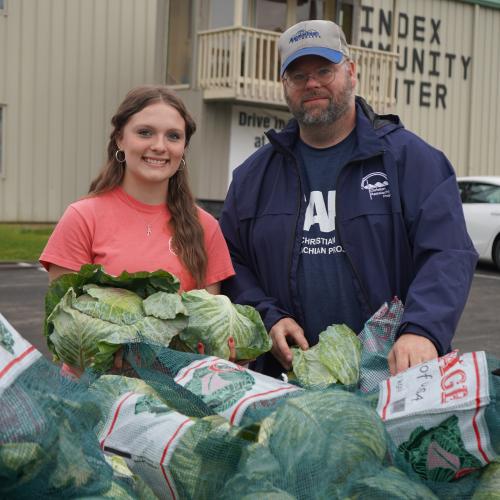 CAP employees and local students helped distribute essential items in Morgan County.