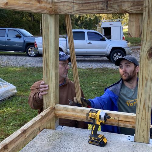 Josh Mullins committed to two years of service with CAP after groups of volunteers helped build his family's home.