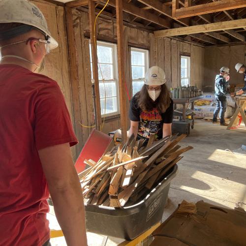 WorkFest Volunteers Work in the Caudill Home