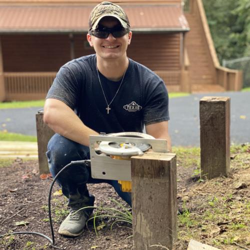 Texas Roadhouse volunteer working at Camp Shawnee