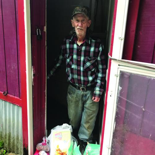Parsie Tackett with food delivery.