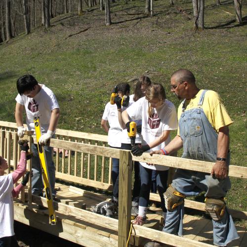 Students from St. Anne's-Belfield build a ramp during YouthFest.